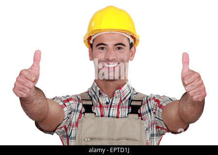 Tradesman giving two thumb's up Stock Photo