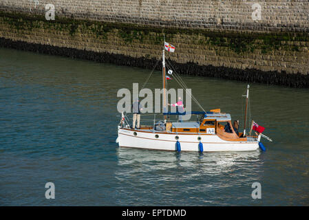 Ramsgate, Kent 21 May 2015. Motor Yacht and Dunkirk veteran, Firefly leaving Ramsgate Royal Harbour for Dunkirk. Credit:  Paul Martin/Alamy Live News Stock Photo