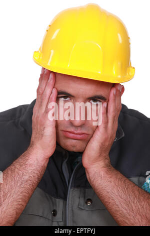 Stressed builder Stock Photo