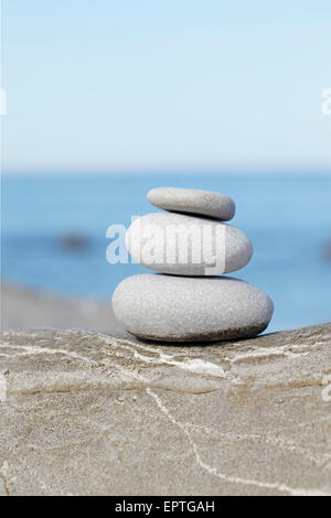 Stacked Balanced Stones, Biarritz, France Stock Photo