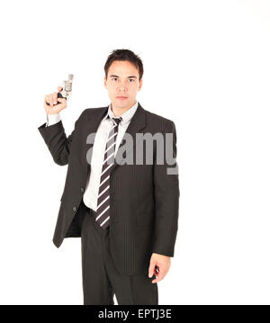 Man pointing a gun in the air Stock Photo