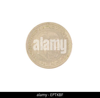 An old Spanish coin of 50 pesetas showing Franco dictator face isolated on white background. 1957 Stock Photo