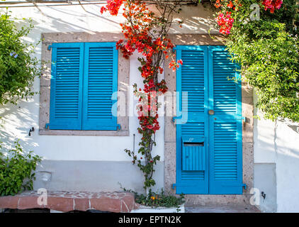 Traditional Houses With Balconies and Flowers Bosa Sardinia Italy Stock Photo