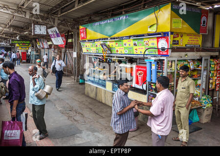 Mumbai India,Indian Asian,Charni Road Railway Station,Western Line,train,public transportation,platform,adult adults man men male,stall,tea,food,vendo Stock Photo