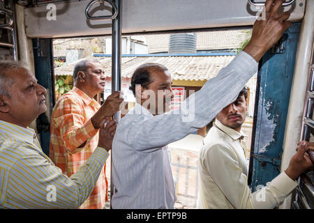 Mumbai India,Indian Asian,Lower Parel Railway Station,Western Line,train,public transportation,adult adults man men male,passenger passengers rider ri Stock Photo