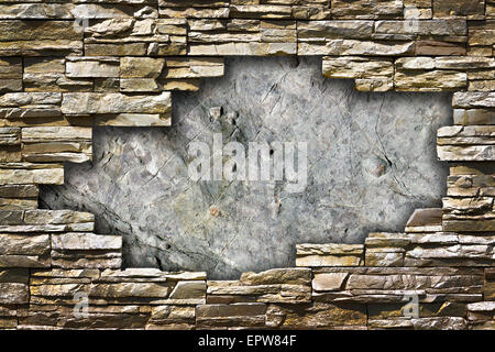 stone wall with a large hole in the middle of a grunge style Stock Photo
