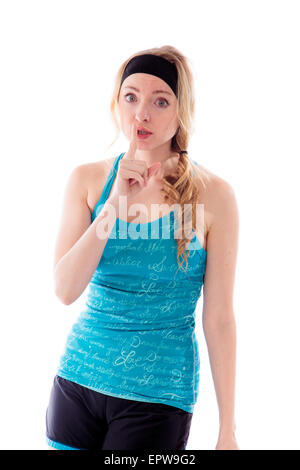 Young woman with finger on lips, portrait Stock Photo - Alamy