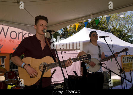 Folk band Dan & Charlie performing on stage at a local music festival (CHIDDFEST 2015), Surrey, UK. Stock Photo