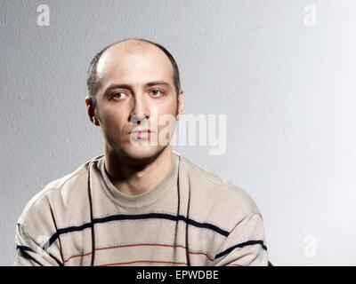 Emotional bald man. 19th Feb, 2014. Sad © Igor Golovniov/ZUMA Wire/ZUMAPRESS.com/Ģ����ý Live News Stock Photo