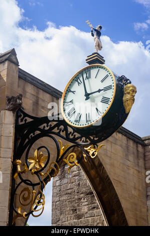 The famous double-faced clock outside of St. Martin-Le-Grand Church, on Coney Street. In York, England, Stock Photo