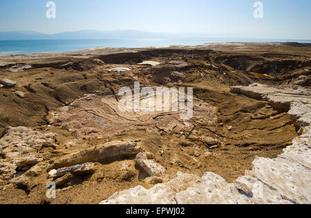 Sinkhole or open pit on the shore's of the dead sea at the end of the summer when the water level is at it's lowest