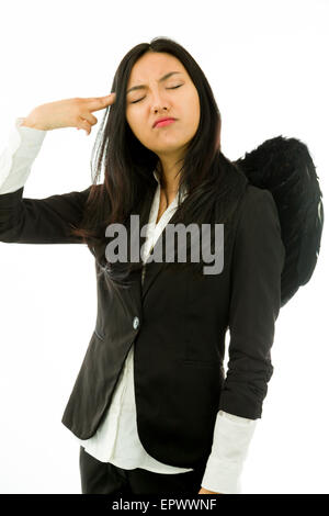 Attractive Asian young adult woman in angels and demon Stock Photo