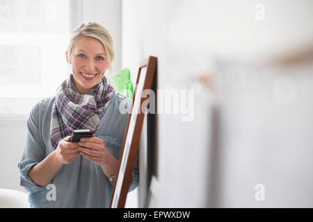 Portrait of woman using cell phone Stock Photo