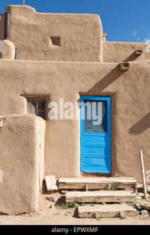 An ancient adobe house in Taos Pueblo, New Mexico, USA. Stock Photo