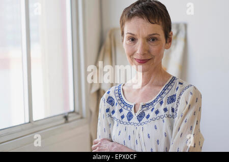 Portrait of senior woman indoors Stock Photo