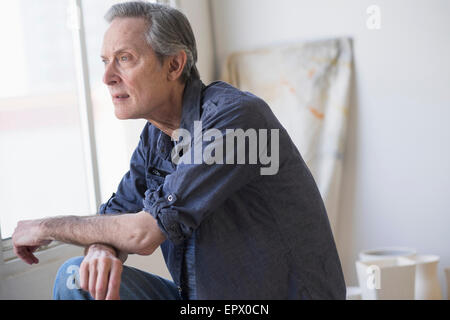 Portrait of senior man indoors Stock Photo