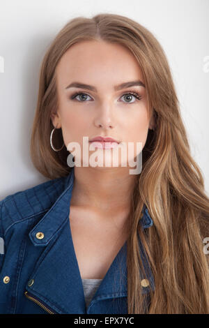 Portrait of a beautiful teenage girl looking towards camera. Stock Photo