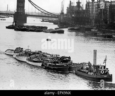 Small boats which returned from Dunkirk to help with the rescue of stranded BEF forces, pass through London on route to their home towns. 10th June 1940 Stock Photo