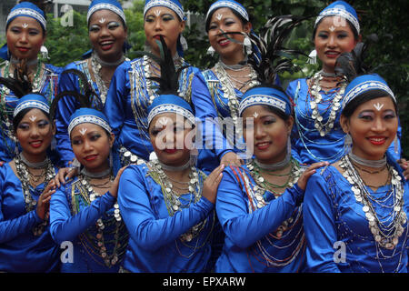 Bangladeshi indigenous peoples with the traditional dress and ornaments as they celebrate the World Indigenous People's Day. Stock Photo