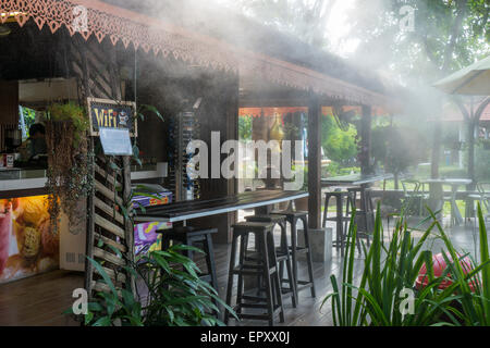 Drizzle as air conditioning in a restaurant, Chiang Mai Province, Thailand, Asia Stock Photo