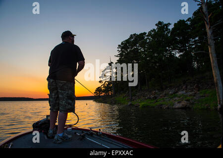 Float tube fly fishing early morning on Lake Megunticook in Camden