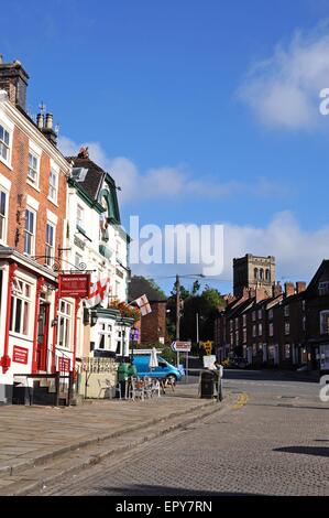 The George and Dragon pub and Cantonese restaurant in the Market Place with the church to the rear, Ashbourne, Derbyshire, UK. Stock Photo