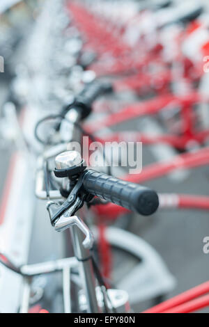 Handlebar of red bicycles parked in a row, Barcelona, Catalonia, Spaincolor image, canon 5DmkII Stock Photo