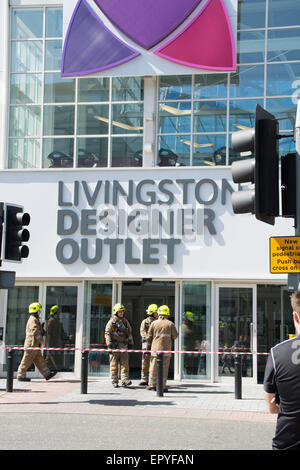 Livingston Designer Outlet fire alarm on Saturday 23rd May. Part of the Centre was evacuated to allow for the Scottish Fire and Rescue teams to enter the building and investigate Credit:  InfotronTof/Alamy Live News Stock Photo