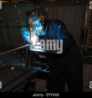 Man Arc Welding Stock Photo
