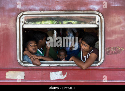 Travelers on Busy Train, Colombo Fort Station, Sri Lanka Stock Photo