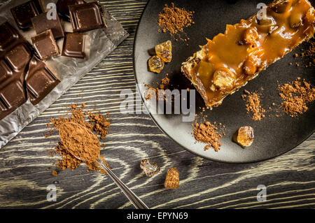 Delicious caramel pie on a wooden table Stock Photo