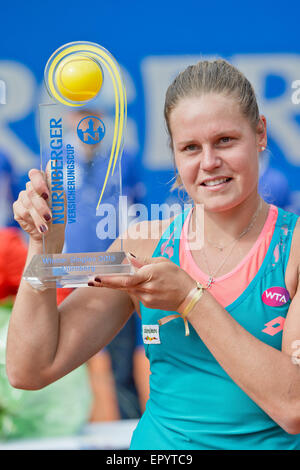 Nuremberg, Germany. 23rd May, 2015. Karin Knapp of Italy holds up her trophy as she celebrates her victory against Roberta Vinci of Italy in the final of the WTA tennis tournament in Nuremberg, Germany, 23 May 2015. PHOTO: DANIEL KARMANN/dpa/Alamy Live News Stock Photo