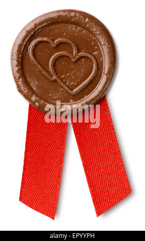 brown wax seal with hearts and ribbon isolated on white with clipping paths Stock Photo