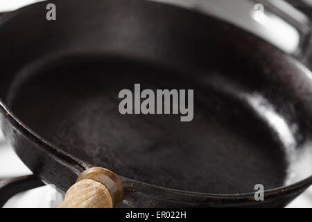 cast iron frying pan on the stove Stock Photo