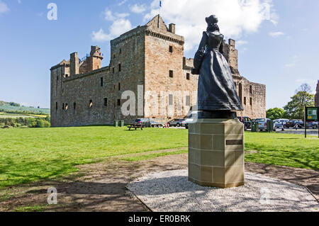 Statue of Mary Queen of Scots looking at Linlithgow Palace  In Linlithgow West Lothian Scotland where she was born Stock Photo