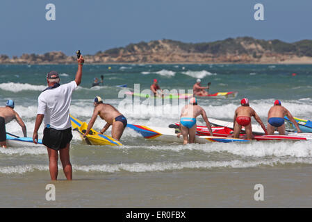 Surf ski race during a lifesaver carnival. Surf coast, Victoria, Australia. Stock Photo