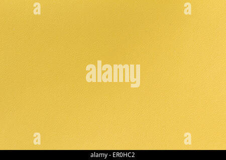 Yellow artificial leather texture as a background Stock Photo