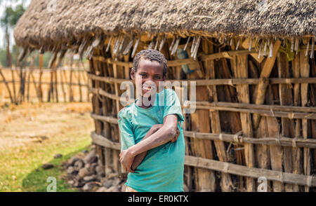 Ethiopian young boy in front of his home. Stock Photo