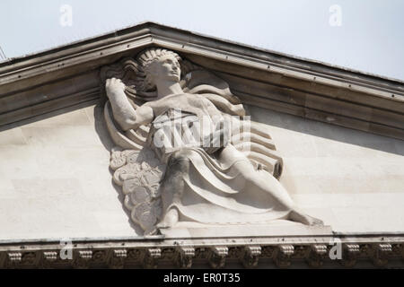 Bank of England architectural feature on roof apex, lady of the bank, Threadneedle street London Stock Photo