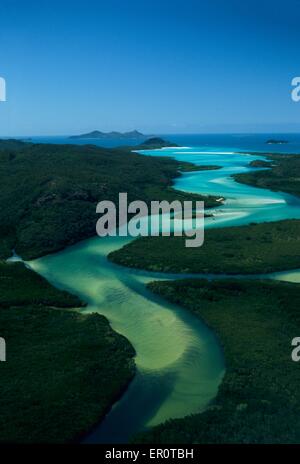 Australia, Queensland, Whitsunday island, sand water canal going down to Hill Inlet and Whitehaven Beach (aerial view) // Austra Stock Photo