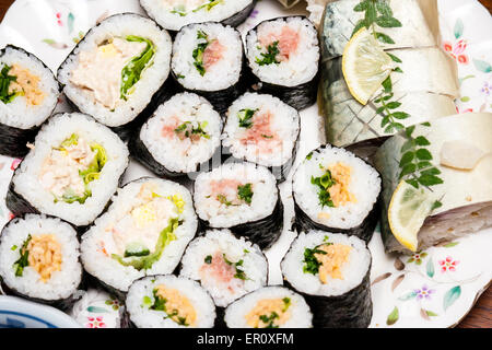 Japan. Plate full of seaweed wrapped sushi rolls, makizushi, various fillings Stock Photo