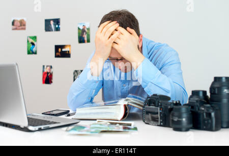 Photographer working in his office. Stock Photo