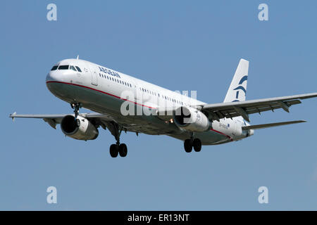 Commercial air travel. Aegean Airlines Airbus A321 commercial passenger jet plane on approach. Quarter front view. Stock Photo