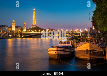 Barges along River Seine with Eiffel Tower beyond, Paris, France Stock Photo