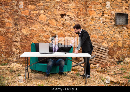 Argument ensuing in a grunge office, a business concept Stock Photo