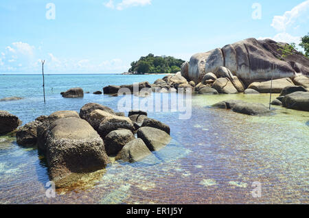 Tanjung Tinggi Beach which is rich for its granites with their various sizes Stock Photo