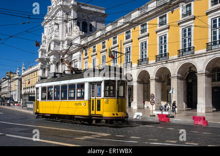 LISBON, PORTUGAL - MARCH 06, 2015:  Old fashioned vintage tram on route 28 in Praca Do Comercio, Lisbon (Lisboa) Stock Photo