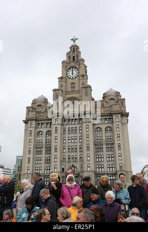 Liverpool, Merseyside, UK. 25th May, 2015. Thousands flock to Albert Dock in Liverpool to see the Three Queens event to celebrate the 175 year anniversary of Cunard as Queen Elizabeth, Queen Victoria and Queen Mary 2 sail along the Mersey and all turn in formation. Credit:  Simon Newbury/Alamy Live News Stock Photo