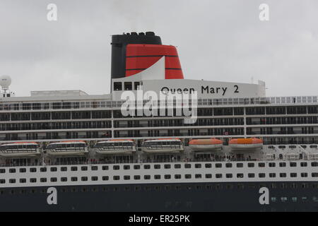 Liverpool, Merseyside, UK. 25th May, 2015. Thousands flock to Albert Dock in Liverpool to see the Three Queens event to celebrate the 175 year anniversary of Cunard as Queen Elizabeth, Queen Victoria and Queen Mary 2 sail along the Mersey and all turn in formation. Credit:  Simon Newbury/Alamy Live News Stock Photo