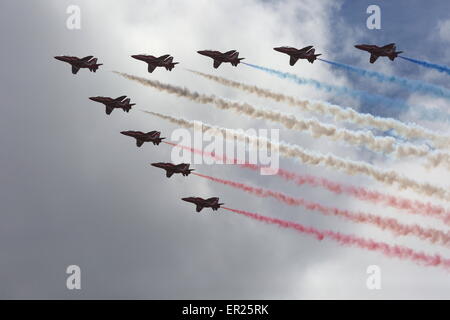 Liverpool, Merseyside, UK. 25th May, 2015. The Red Arrows fly past the Three Queens event to celebrate the 175 year anniversary of Cunard as Queen Elizabeth, Queen Victoria and Queen Mary 2 sail along the Mersey and all turn in formation. Credit:  Simon Newbury/Alamy Live News Stock Photo